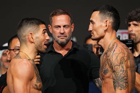 Ilia Topuria and Max Holloway face off