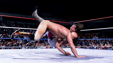 Jake Roberts performing the DDT