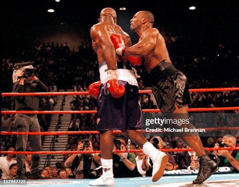 Tyson bites Holyfield