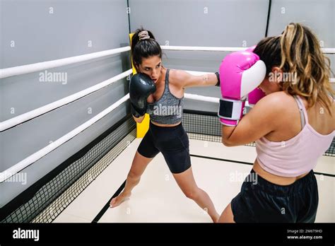 Women practicing kickboxing